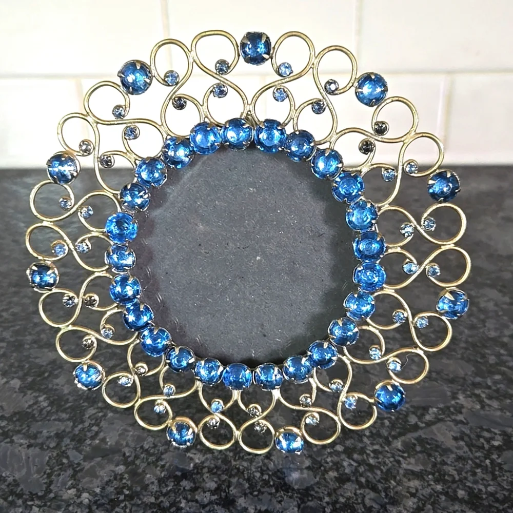 Gold Metal Round Frame Bedazzled with Blue Gem Stones